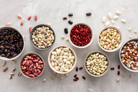 Different types of beans in bowls, economically important legume, top view, copy spaceの写真素材