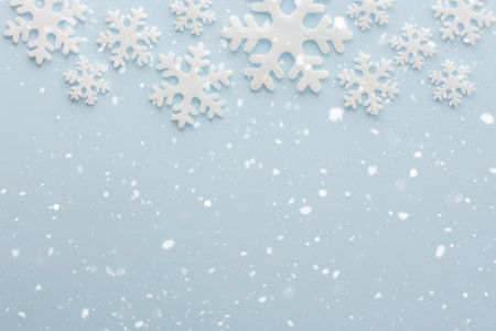 White snowflakes on a blue background and snow, Christmas background, Merry Christmas and Happy New...