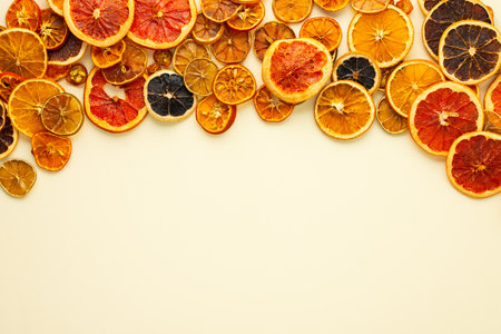 Background of dried citrus, fruits sliced orange and tangerine, lime and lemon, kumquat and grapefruit slices , preparation for the celebration of Christmas, copy spaceの写真素材