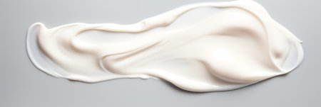 Face lotion cream sample, white cream sample on a light background, lotion texture, a smear of moisturizer closeup, beauty and skin care concept, bannerの素材