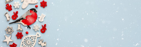 White and red Christmas toys on a blue background, Merry Christmas and Happy New Year banner, top view, copy spaceの写真素材