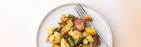 Stewed duck fillet with potatoes and asparagus and radishes,healthy delicious breakfasts or lunches, bannerの写真素材