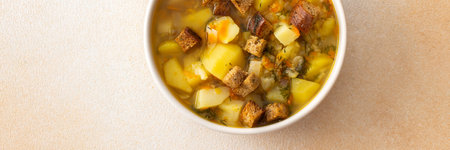 Pea soup with fried croutons, healthy bean soup, bannerの写真素材