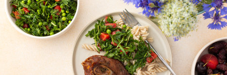 Delight in a hearty breakfast or lunch with tender turkey, gluten-free pasta, and a refreshing salad of seasonal vegetables and herbs, rounded off with sweet, ripe fruits for a complete meal, bannerの写真素材