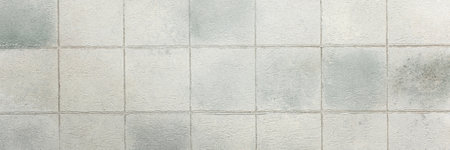 Gray tiles create a sleek and glossy background, adding depth and sophistication to any interior or design project, bannerの写真素材