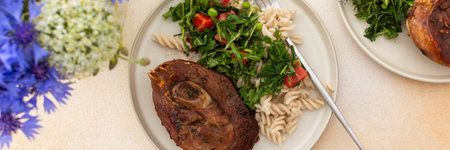 Delight in a hearty breakfast or lunch with tender turkey, gluten-free pasta, and a refreshing salad of seasonal vegetables and herbs, rounded off with sweet, ripe fruits for a complete meal, bannerの写真素材