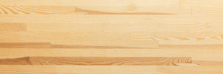 A minimalist wooden texture backdrop, offering soft tones and a clean surface for creative design, top view and copy spaceの写真素材