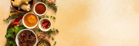 A warm display of spices and herbs on a beige background, each adding rich aromas and flavors, perfect for enhancing recipesの写真素材