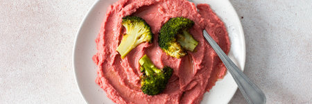 Nutritious and hearty breakfast includes beetroot hummus for a protein-rich, fiber packed mealの写真素材