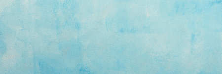 A minimalist soft blue texture backdrop, offering soft tones and a clean surface for creative design, top view and copy space, bannerの写真素材
