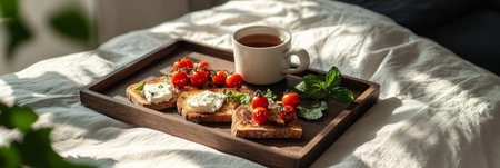 Delicious breakfast featuring creative toasts topped with eggs and fresh tomatoes, paired with a warm cup of tea, all arranged on a wooden tray in a soft, cozy bedroom, bannerの素材