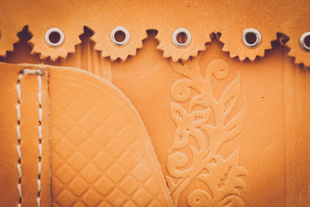 Colour detail of stitched leather clothingの写真素材