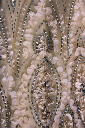 Embroidery and beading on lace