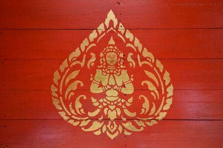 Thailand gold pattern on a red wood