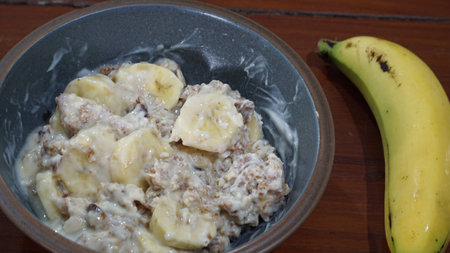 Breakfast with healthy muesli and bananaの写真素材