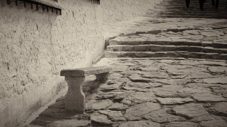 Marble stone bench with rock floor,black and white toneの写真素材