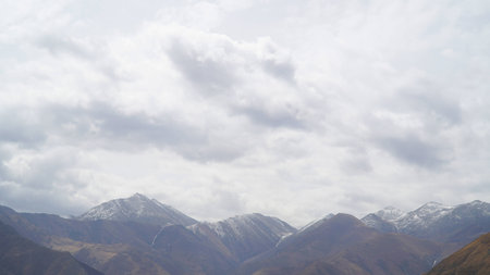 Mountain with some cloud on the blue clear skyの写真素材