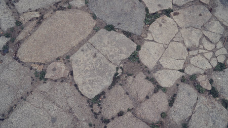 Stone floor with some dust and tiny stones on the floorの写真素材