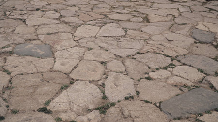 Stone floor with some dust and tiny stones on the floorの写真素材