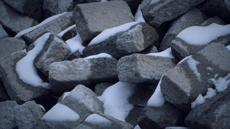Big rocks with some of snow on stoneの写真素材