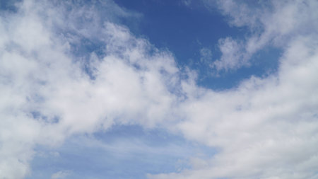 Clouds and clear blue skyの写真素材