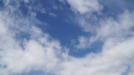 Clouds and clear blue skyの写真素材