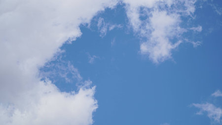 Clouds and clear blue skyの写真素材
