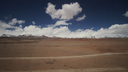 Mountain and Land with some of clouds and sky with high contrastの写真素材