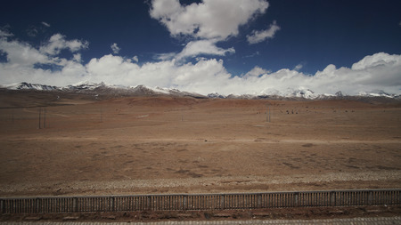 Mountain and Land with some of clouds and sky with high contrastの写真素材