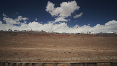 Mountain and Land with some of clouds and sky with high contrastの写真素材