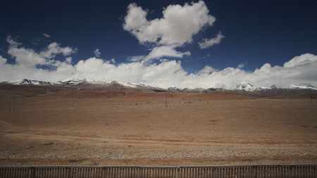 Mountain and Land with some of clouds and sky with high contrastの写真素材