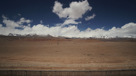 Mountain and Land with some of clouds and sky with high contrastの写真素材