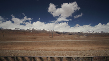 Mountain and Land with some of clouds and sky with high contrastの写真素材