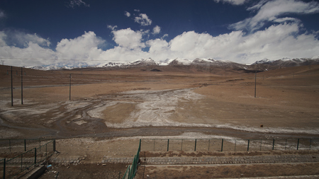 Mountain and Land with some of clouds and sky with high contrastの写真素材