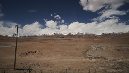Mountain and Land with some of clouds and sky with high contrastの写真素材