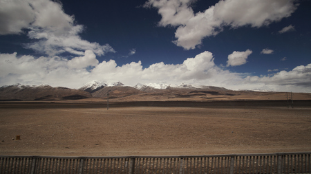 Mountain and Land with some of clouds and sky with high contrastの写真素材