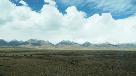 Mountain and land with old town look and clear sceneryの写真素材