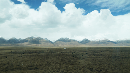 Mountain and land with old town look and clear sceneryの写真素材