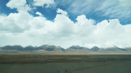 Mountain and land with old town look and clear sceneryの写真素材