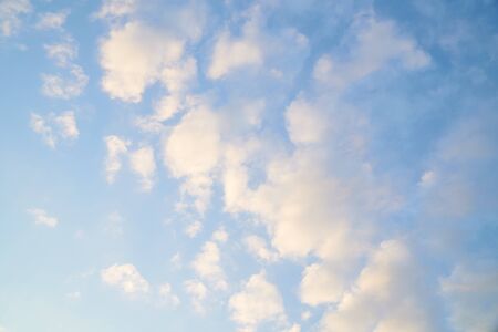 Clear blue sky with some cloudの写真素材