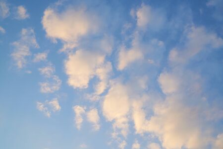 Clear blue sky with some cloudの写真素材