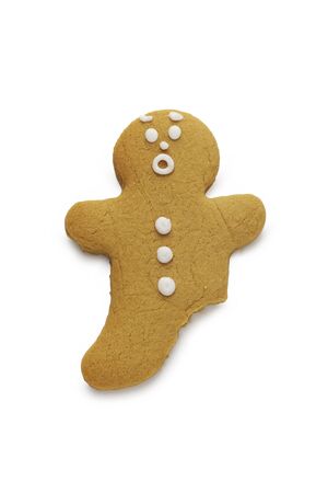 A surprised looking gingerbread man with a leg missingの写真素材