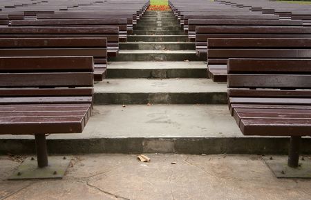 Wooden benches in plaza of parkの写真素材