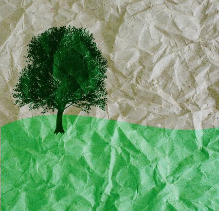 tree on recycle paperの写真素材