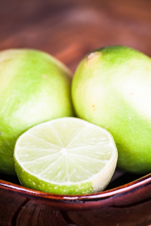 Close up fresh citrus lime wholes and sliceの写真素材