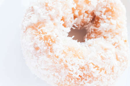Piece of vanilla coconut donut up close, stock photoの写真素材