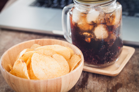 Crispy potato chips with iced cola, stock photoの写真素材