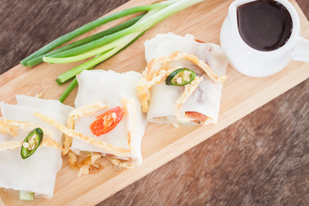Fresh spring rolls on wooden table, stock photoの写真素材