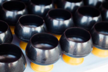 Monk's alms-bowl in temple, stock photoの写真素材