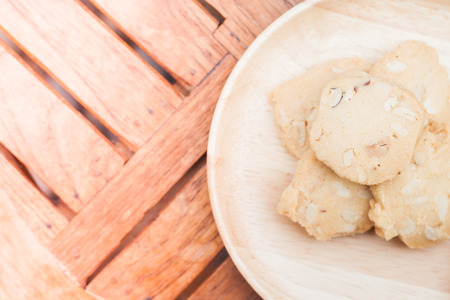 Cashew cookies on wooden plate, stock photoの写真素材